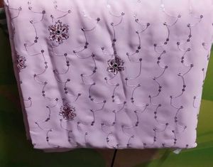 Silk georgette Baby pink saree.