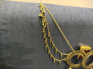 Gold tonned earrings with ear Chain