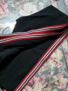 Striped Leggings with Red Accents