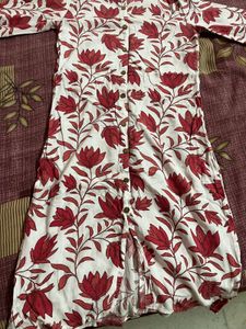 White Kurti with pink coloured Lotus on it
