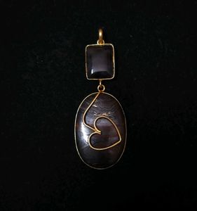 Unique Stone Gold Tone Pendant
