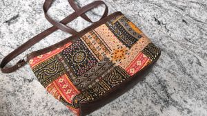 Sling Bag With Two Zips