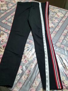 Striped Leggings with Red Accents