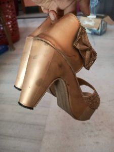 Gold Heels with Bow Detail