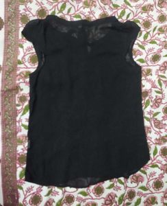 A cute transparent black top