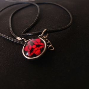 Sasuke Mangekyou Sharingan Chain Or Necklace.