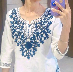 Elegant White Embroidered kurti