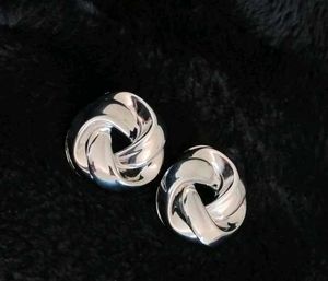 Silver Toned Spiral Curved Earings - 1 Pair