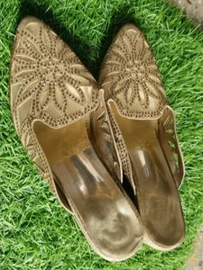 Woman Golden Heels