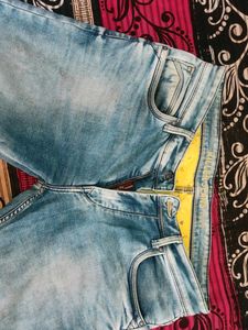 Stylish blue faded Killer jeans in good condition!