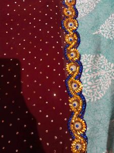 Elegant Maroon Embellished Saree