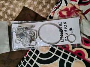 Jewelry Set: 2 Necklace , Ring and a Bracelet