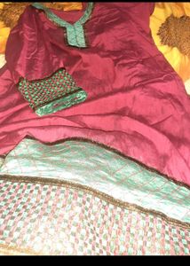 It's Glazed Cotton Kurta With Shaded Dupatta.