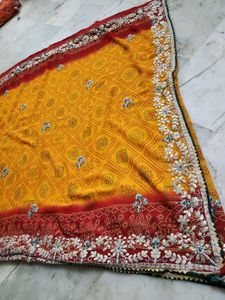 Red and yellow bandhni saree