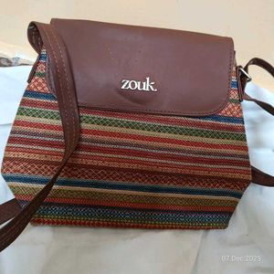 zouk brand new flap sling bag