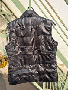 Almost brand new sleeveless black jacket