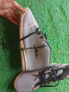 Man And Woman Sports Shoes