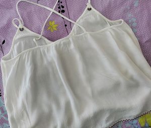 sleeveless top ,bust size-36,goes well on jeans and skirts