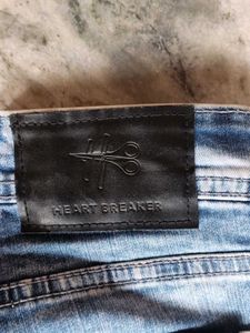 Ripped Blue Denim Jeans