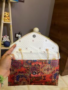 Sling Cum Clutch