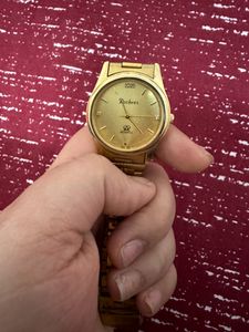 Rochees golden watch