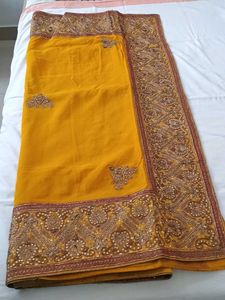 Elegant Yellow Embroidered Saree