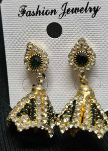 green emerald-toned earrings