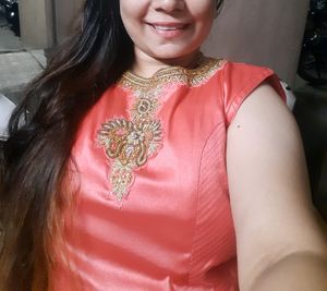 Long Sleeveless Gown