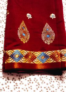 Elegant Maroon Embroidered Saree