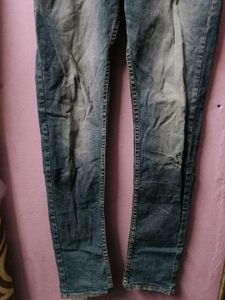 Distressed Blue Denim Jeans
