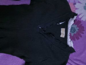 Women Knitted Type Top With Laces On The Neck