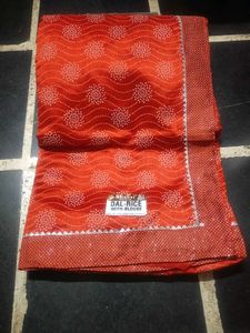 Rust Printed Synthetic Saree with Blouse Piece