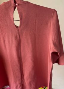 dark pink top with round neck