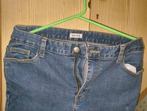 Ripped Blue Denim Jeans