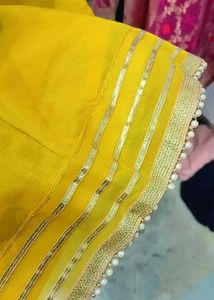 Yellow Salwar Kameez with Pink Dupatta