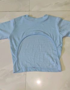 A Blue Crop Top With Crochet