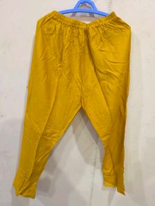 Mustard churidar pant.