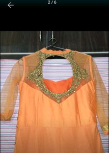 A Beautiful Party Wear Oranga Gown