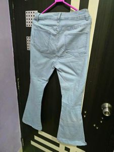 Women Ripped Flare Leg Jeans