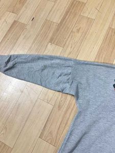Floral Embroidered Pullover.
