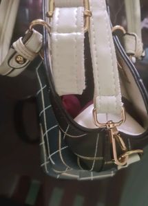 👜