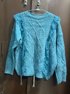 sky blue sweater