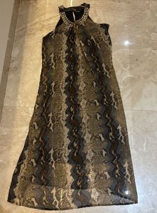 Brown A-line dress with neck embellishments