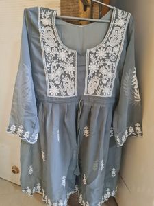 Its a Casual Kurti With Chikankari Pattern