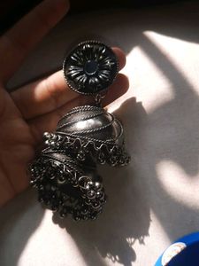 The black and big earring