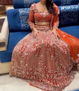 Price : 25k Gorgeous Orange Lehenga Choli Set