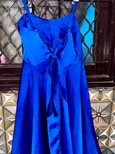blue silk backless with tie up straps middy dress