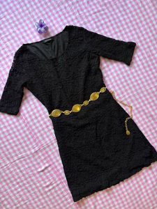 Embroidered black dress