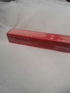 RARE BEAUTY LIP OIL (SERENITY)
