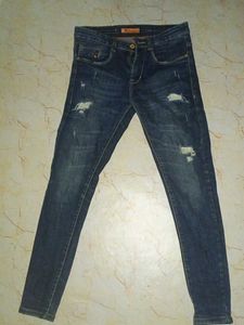 Distressed Blue Jeans